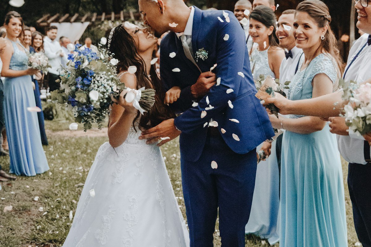Aarav and Diya in royal wedding attire at palace courtyard